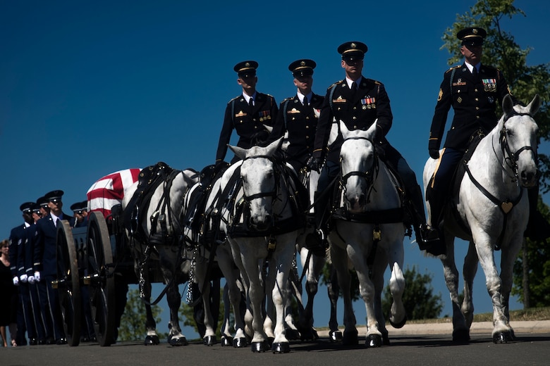 A horse-led caisson escorts the casket of Capt. Mark Weber during his funeral service, July 9, 2018, at Arlington National Cemetery, Va. Weber, a 38th Rescue Squadron combat rescue officer and Texas native, was killed in an HH-60G Pave Hawk crash in Anbar Province, Iraq, March 15. Friends, family, and Guardian Angel Airmen traveled from across the U.S. to attend the ceremony and pay their final respects. (U.S. Air Force photo by Staff Sgt. Ryan Callaghan)