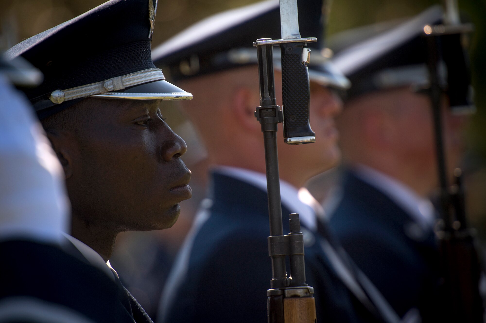 A U.S. Air Force Honor Guard ceremonial guardsman stands in formation during a funeral service for Capt. Mark Weber, July 9, 2018, at Arlington National Cemetery, Va. Weber, a 38th Rescue Squadron combat rescue officer and Texas native, was killed in an HH-60G Pave Hawk crash in Anbar Province, Iraq, March 15. Friends, family, and Guardian Angel Airmen traveled from across the U.S. to attend the ceremony and pay their final respects. (U.S. Air Force photo by Staff Sgt. Ryan Callaghan)