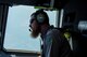 Matt Stevens, a U.S. Department of Agriculture airport biologist, looks for possible bird congregation areas during a C-17 Globemaster III low level flight over California July 2, 2018. The flight allowed Stevens, who helps manage the Bird/Wildlife Aircraft Strike Program at Travis Air Force Base, Calif., to get a firsthand view of what pilots see during training flights near the base. (U.S. Air Force photo by Master Sgt. Joey Swafford)