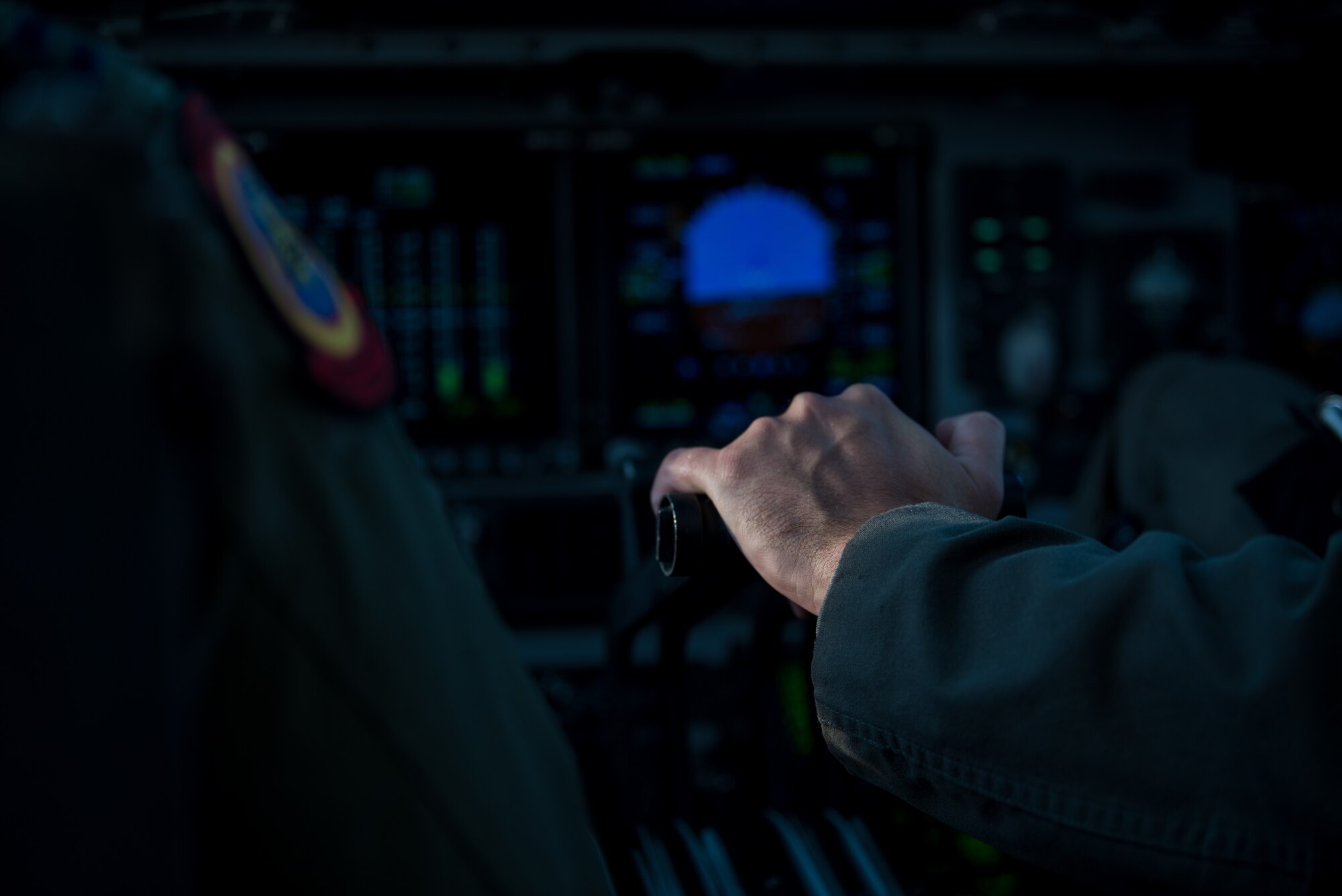 U.S. Air Force Capt. Sean Harte, 60th Air Mobility Wing Safety Office flight commander, flies a C-17 Globemaster III over California during a safety office familiarization flight July 2, 2018. The flight allowed Matt Stevens, a U.S. Department of Agriculture airport biologist, who helps manage the Bird/Wildlife Aircraft Strike Program at Travis Air Force Base, Calif., to get a firsthand view of what pilots see during training flights near the base. (U.S. Air Force photo by Master Sgt. Joey Swafford)