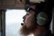 Matt Stevens, a U.S. Department of Agriculture airport biologist, looks for possible bird congregation areas during a C-17 Globemaster III low level flight over California July 2, 2018. The flight allowed Stevens, who helps manage the Bird/Wildlife Aircraft Strike Program at Travis Air Force Base, Calif., to get a firsthand view of what pilots see during training flights near the base. (U.S. Air Force photo by Master Sgt. Joey Swafford)