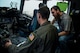 Matt Stevens, right, a U.S. Department of Agriculture airport biologist, and U.S. Air Force Capt. Sean Harte, 60th Air Mobility Wing Safety Office flight commander, go over C-17 Globemaster III pre-flight procedures at Travis Air Force Base, Calif., July 2, 2018. The flight allowed Stevens, who helps manage the Bird/Wildlife Aircraft Strike Program at Travis get a firsthand view of what the pilots see during training flights near the base. (U.S. Air Force photo by Master Sgt. Joey Swafford)