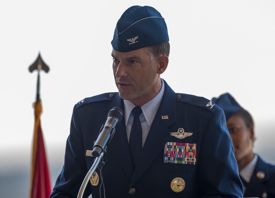 U.S. Air Force Col. Ethan Griffin delivers his first speech as commander, 60th Air Mobility Wing, during a change of command ceremony, July 10, 2018, Travis Air Force Base, Calif.  Klein relinquished command of Air Mobility Command's largest wing to Col. Ethan Griffin. (U.S. Air Force Photo by Heide Couch)