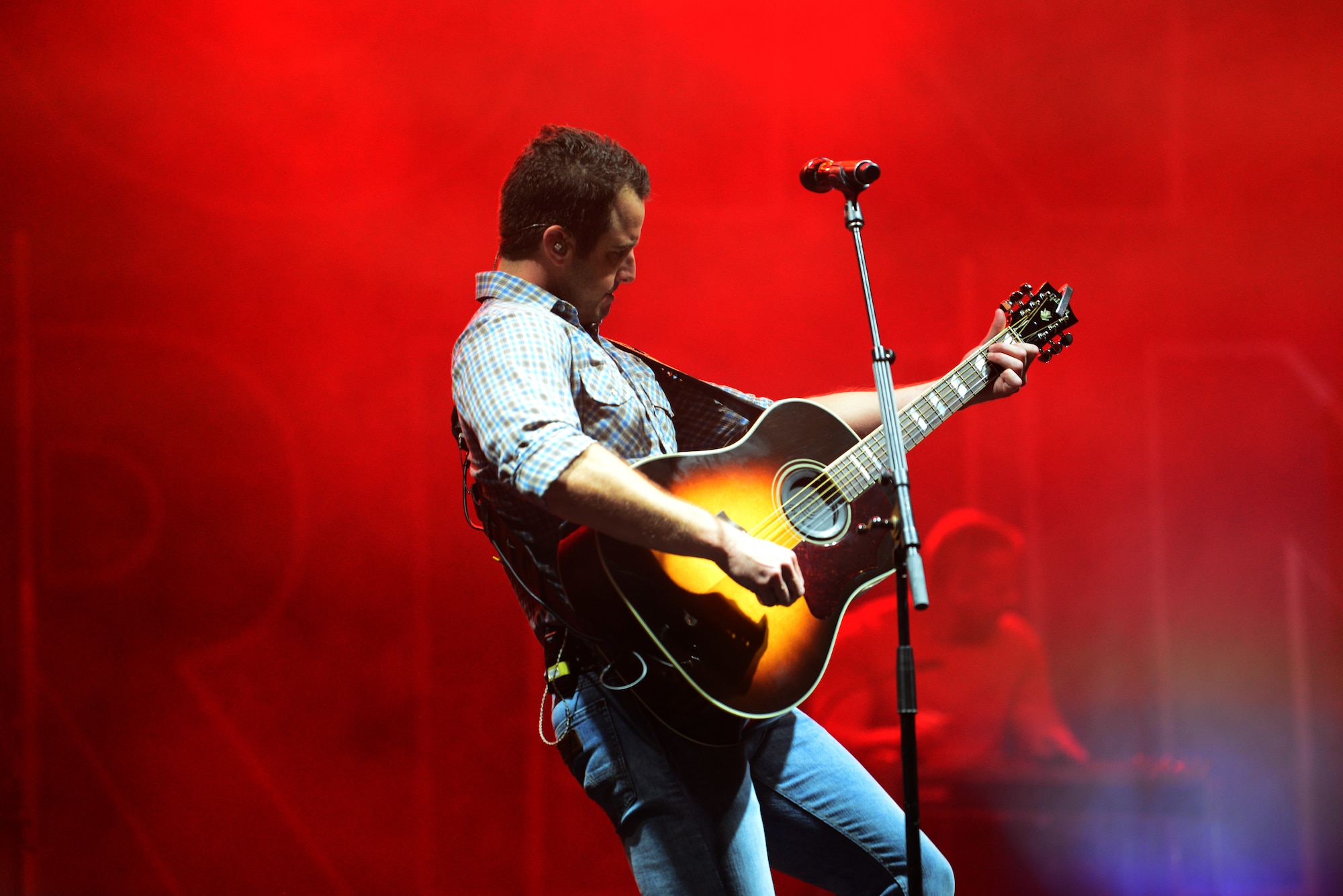 Easton Corbin, American country music singer, plays a guitar at Patriot Fest July 6, 2018, on Columbus Air Force Base, Mississippi. Both music groups were a part of a five-base tour with Air Force Entertainment. (U.S. Air Force photo by Airman 1st Class Beaux Hebert)