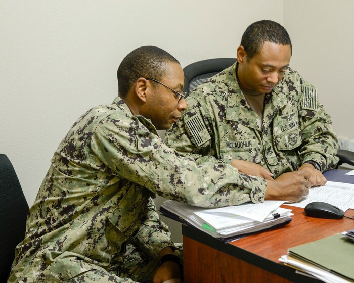 Sailor meets with career counselor.
