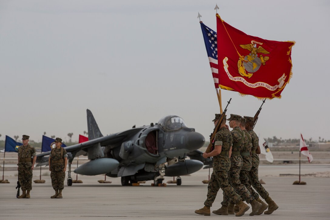 U.S. Marines with Headquarters and Headquarters Squadron (H&HS), Marine Corps Air Station (MCAS) Yuma, participate in the Change of Command Ceremony where Lt. Col. James S. Tanis, commanding officer for H&HS relinquished command to Lt. Col. James C. Paxton on MCAS Yuma, Ariz., June 15, 2018. The Change of Command Ceremony represents the transfer of responsibility, authority, and accountability from the outgoing commanding officer to the incoming commanding officer. (U.S. Marine Corps photo by Sgt. Allison Lotz)