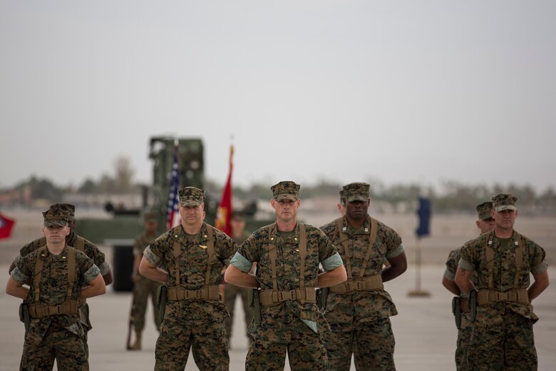U.S. Marines with Headquarters and Headquarters Squadron (H&HS), Marine Corps Air Station (MCAS) Yuma, participate in the Change of Command Ceremony where Lt. Col. James S. Tanis, commanding officer for H&HS relinquished command to Lt. Col. James C. Paxton on MCAS Yuma, Ariz., June 15, 2018. The Change of Command Ceremony represents the transfer of responsibility, authority, and accountability from the outgoing commanding officer to the incoming commanding officer. (U.S. Marine Corps photo by Sgt. Allison Lotz)