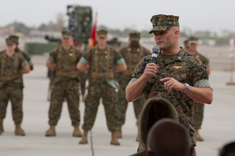 U.S. Marines with Headquarters and Headquarters Squadron (H&HS), Marine Corps Air Station (MCAS) Yuma, participate in the Change of Command Ceremony where Lt. Col. James S. Tanis, commanding officer for H&HS relinquished command to Lt. Col. James C. Paxton on MCAS Yuma, Ariz., June 15, 2018. The Change of Command Ceremony represents the transfer of responsibility, authority, and accountability from the outgoing commanding officer to the incoming commanding officer. (U.S. Marine Corps photo by Sgt. Allison Lotz)