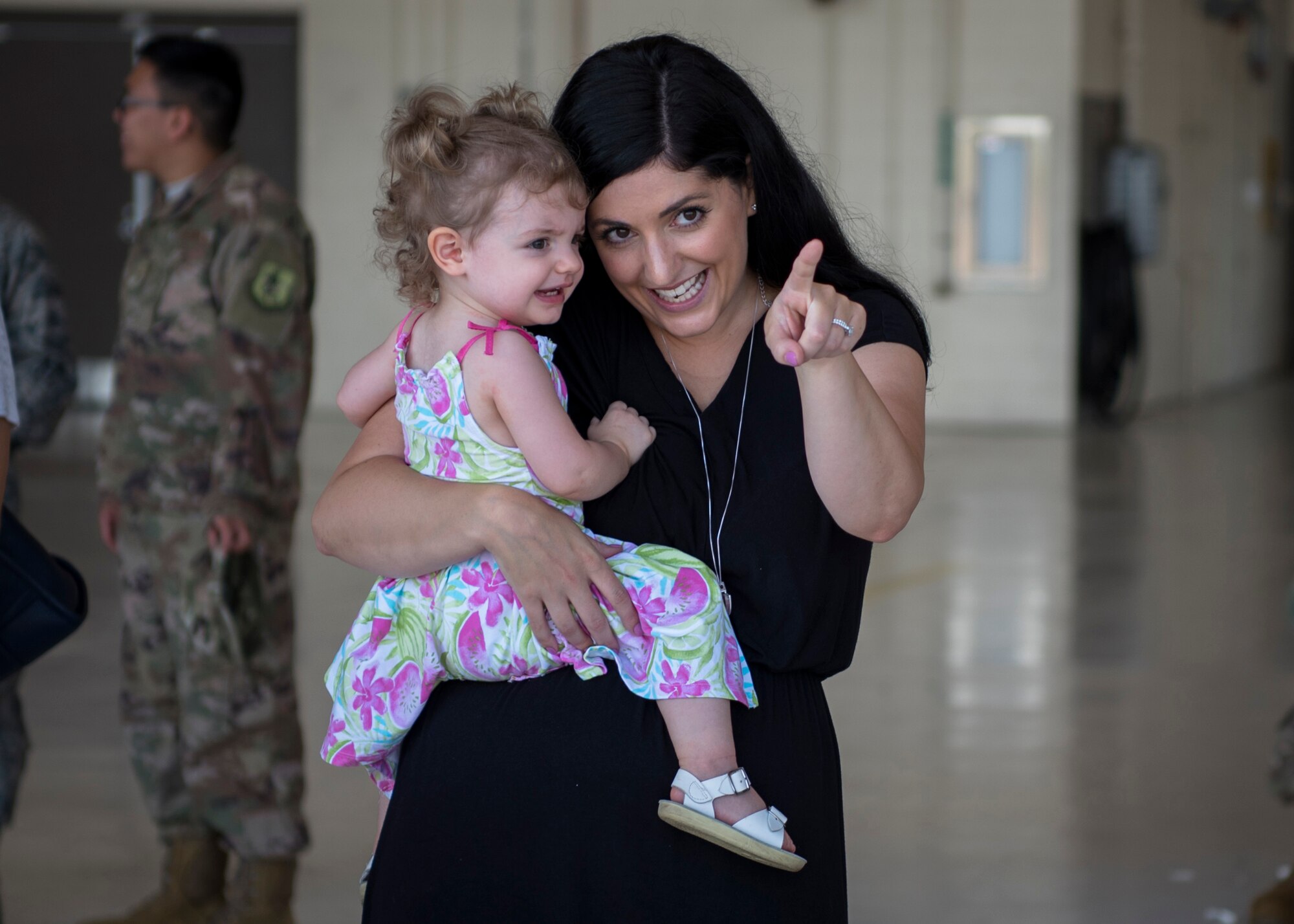 Family and friends await the arrival of their loved ones during the 41st Rescue Squadron’s (RQS) redeployment ceremony, July 10, 2018, at Moody Air Force Base, Ga. While deployed, the 41st RQS and the 41st Helicopter Maintenance Unit provided combat search and rescue capabilities and maintenance operations in support of Combined Joint Task Force-Horn of Africa. (U.S. Air Force photo by Airman Taryn Butler)