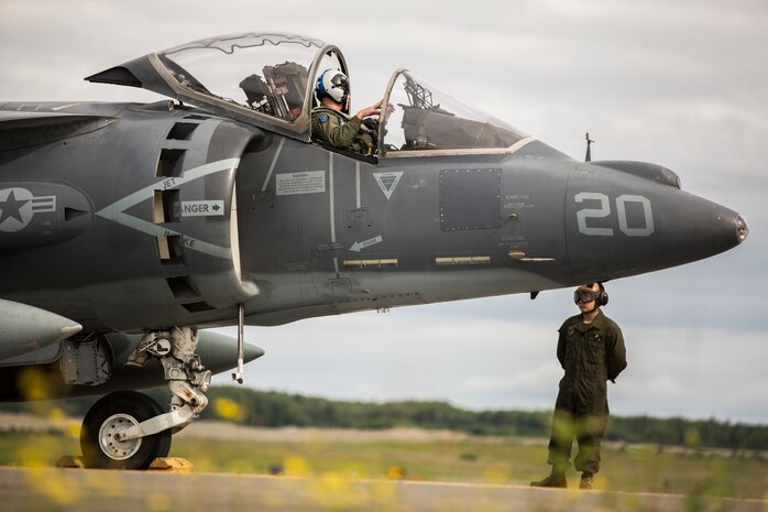 Marine Attack Squadron (VMA) 214 Marines participate in the 2018 Arctic Thunder Air Show at Joint Base Elmendorf-Richardson, Alaska, June 29, 2018. VMA-214 conducted a flyby and hover demonstration with the AV-8B Harrier during the air show. (U.S. Marine Corps photo by Lance Cpl. Sabrina Candiaflores)