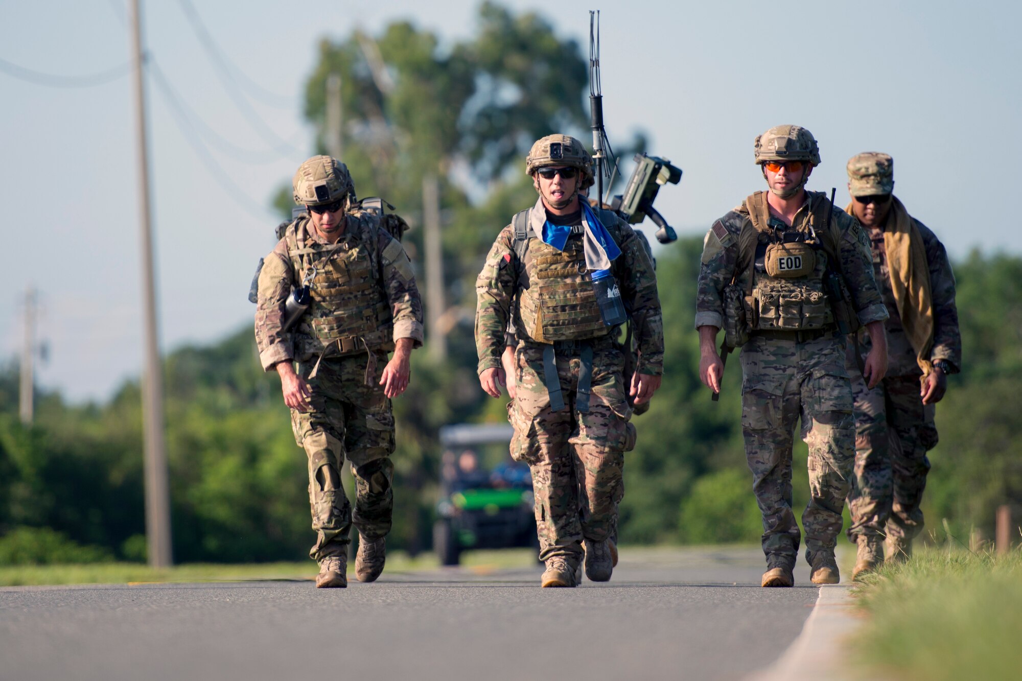 U.S. Air Force Explosive Ordnance Disposal Airmen with 6th Civil Engineer Squadron ruck march five miles at MacDill Air Force Base, Fla., July 2, 2018.