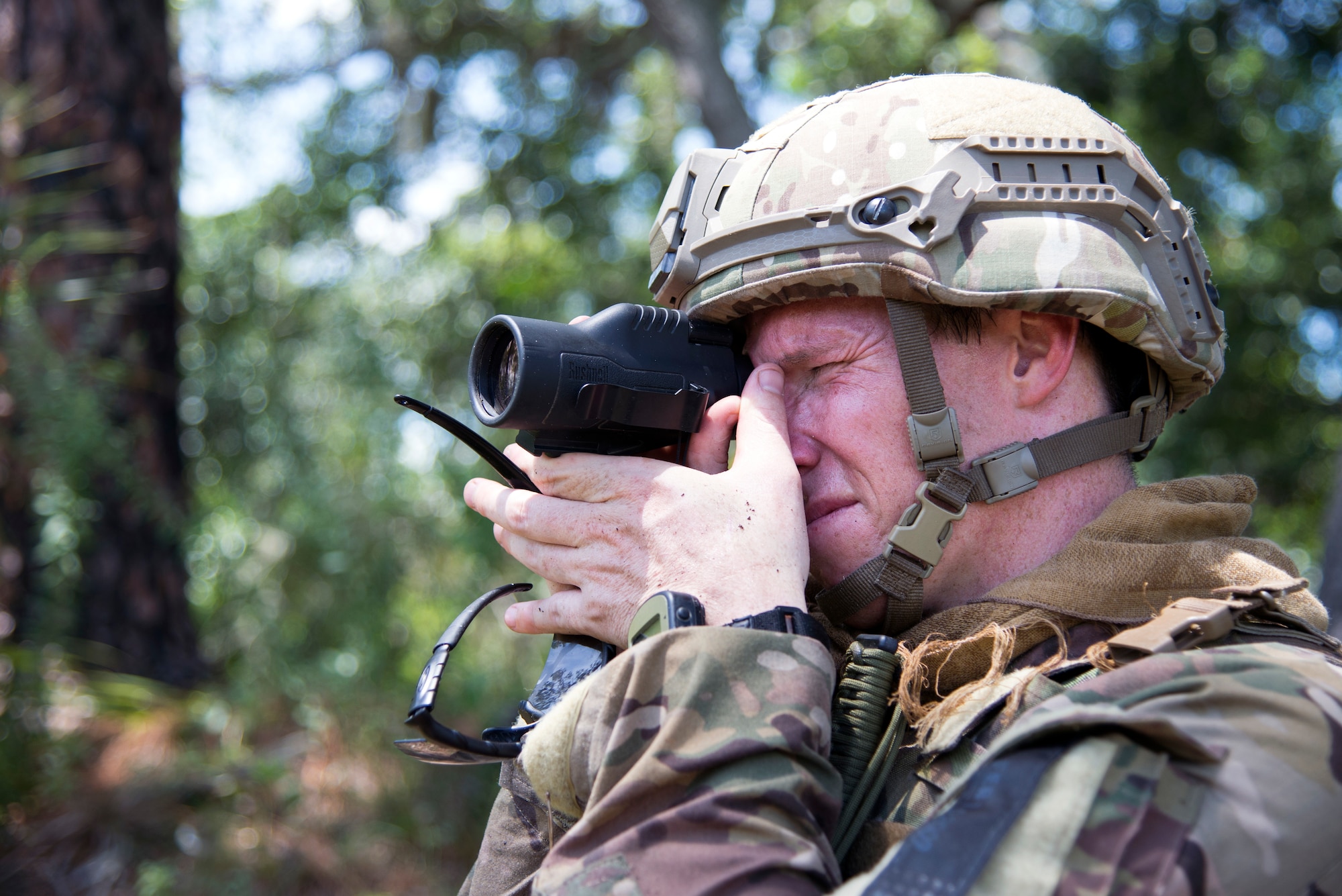 U.S. Air Force Tech. Sgt. Michael Sweeney, NCOIC of explosive ordnance disposal operations assigned to the 6th Civil Engineer Squadron, uses a rangefinder during a training exercise at MacDill Air Force Base, Fla., July 2, 2018.