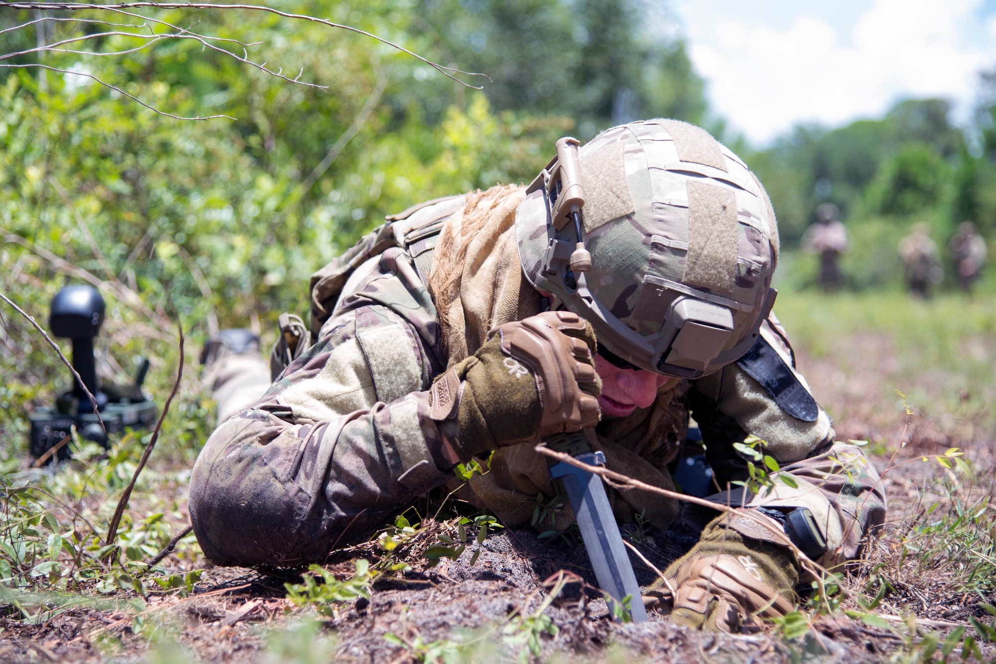 U.S. Air Force Tech. Sgt. Michael Sweeney, NCOIC of explosive ordnance disposal operations assigned to the 6th Civil Engineer Squadron, probes for a simulated improvised explosive device at MacDill Air Force Base, Fla., July 2, 2018.