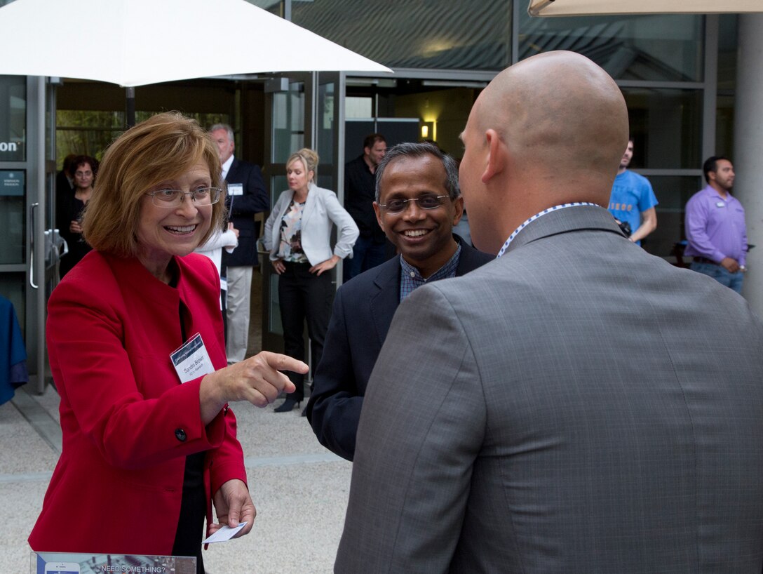 Sandra Brown, Vice Chancellor of UC San Diego, converses with a graduate after the graduation ceremony, Monday, June 4, 2018, at the Ida and Cecil Green Faculty Club aboard UC San Diego. The graduating class consisted of service members and veterans. The course was taught in partnership with SmartMoney Veterans and is designed to help transitioning service members and veterans leverage the skills they already have and translate those skills into launching businisses and creating successful civilian careers. (U.S. Marine Corps photo by Lance Cpl. Hanna Powell)