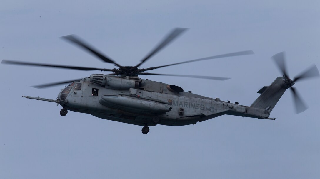 A U.S. Marine Corps CH-53E Super Stallion helicopter passes by during helocast training with Marines from 1st Reconnaissance Battalion and Canadian soldiers with the Royal 22e Régiment as part of Rim of the Pacific (RIMPAC) exercise off the coast of Marine Corps Base Camp Pendleton, California, July 9, 2018. Helocasting is an airborne technique used by small unit, reconnaissance forces to insert into a military area of operations or maritime insertion point. RIMPAC demonstrates the value of amphibious forces and provides high-value training for task-organized, highly capable Marine Air-Ground Task Forces enhancing the critical crisis response capability of U.S. forces and partners globally. Twenty-five nations, 46 ships, five submarines, about 200 aircraft and 25,000 personnel are participating in RIMPAC from June 27 to Aug. 2 in and around the Hawaiian Islands and Southern California.