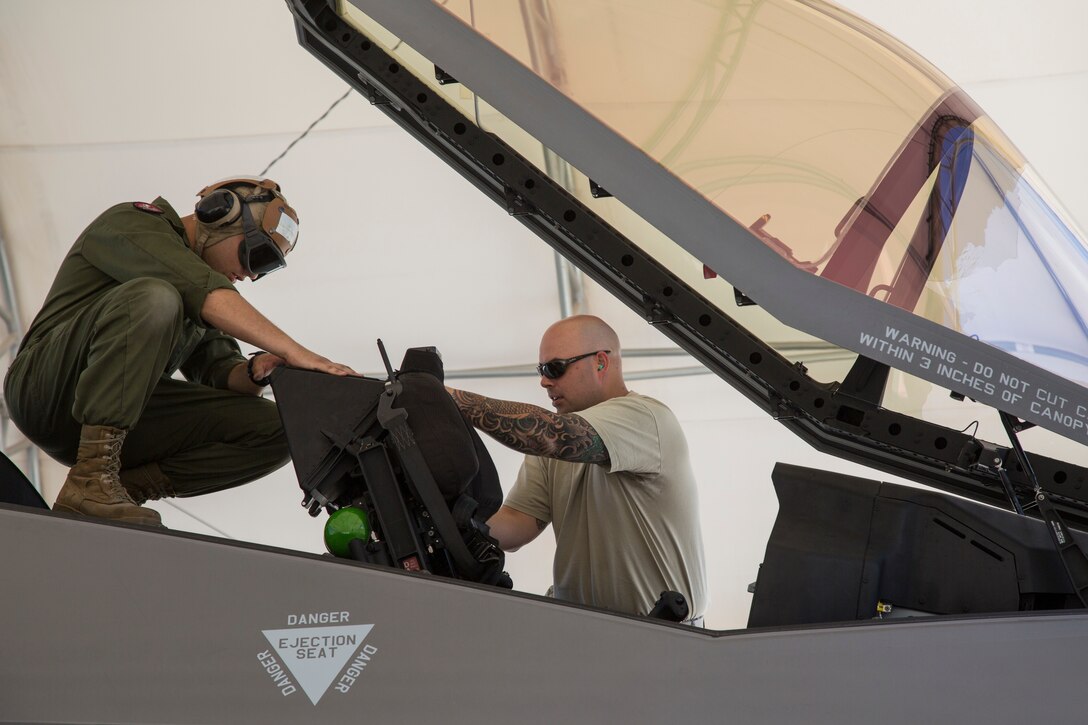 U.S. Marines with Marine Fighter Attack Squadron (VMFA) 122, Marine Corps Air Station (MCAS) Yuma, conduct exercises with U.S. Airmen attached to the 4th Aircraft Maintenance Unit, Hill Air Force Base, Utah, on MCAS Yuma, Ariz., June 26, 2018. The exercise tested, for the first time, the interoperability of loading weapon systems between the services F-35's. The U.S. Air Force operates with the F-35A Lightning II, while the U.S. Marine Corps operates with the F-35B Lightning II. (U.S. Marine Corps photo by Sgt. Allison Lotz)