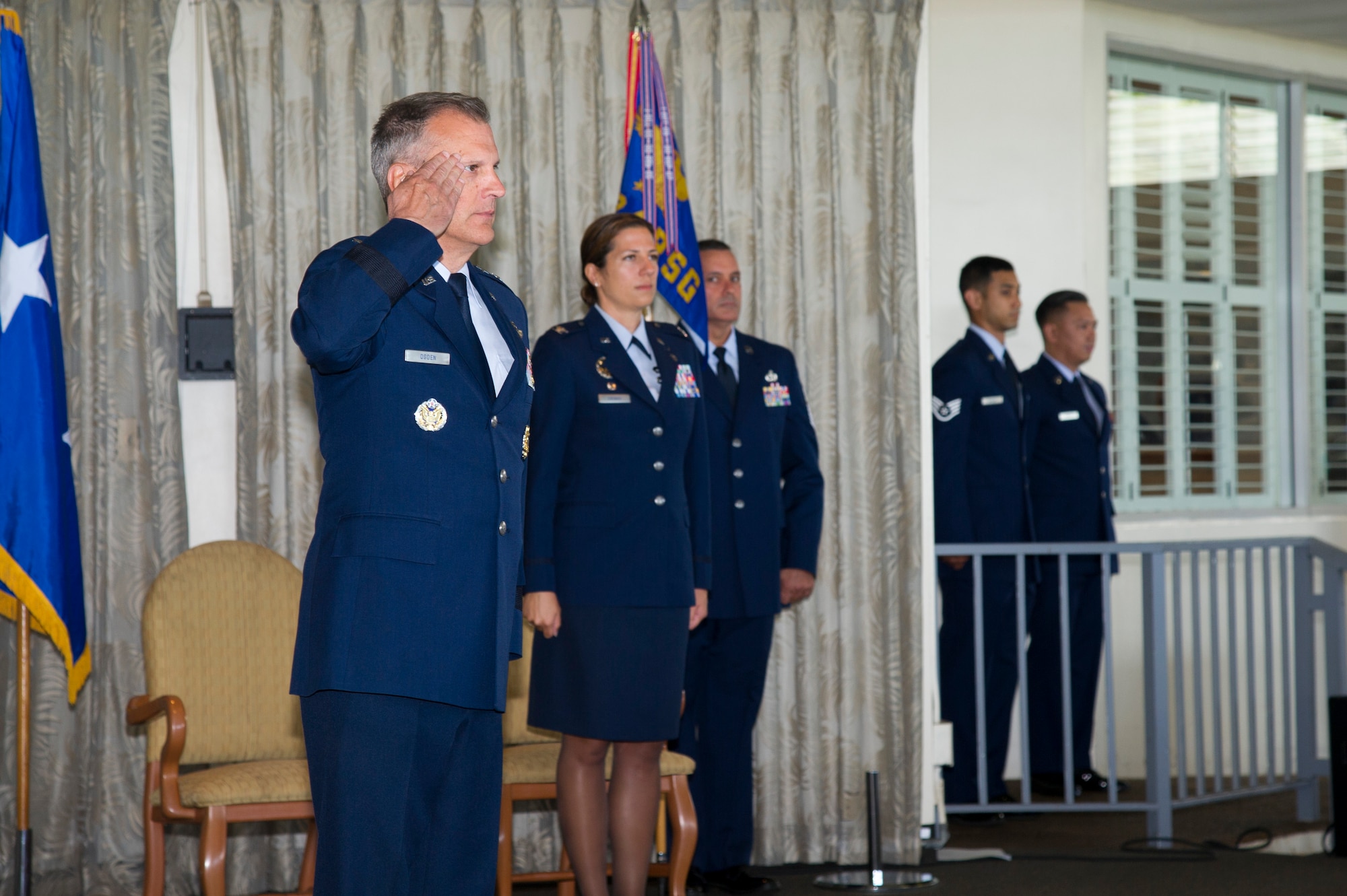 U.S. Air Force Maj. Gen. Randall Ogden, 4th Air Force commander, salutes Reserve Citizen Airmen from the 624th Regional Support Group during an assumption of command ceremony at Joint Base Pearl Harbor-Hickam, Hawaii, July 7, 2018.
