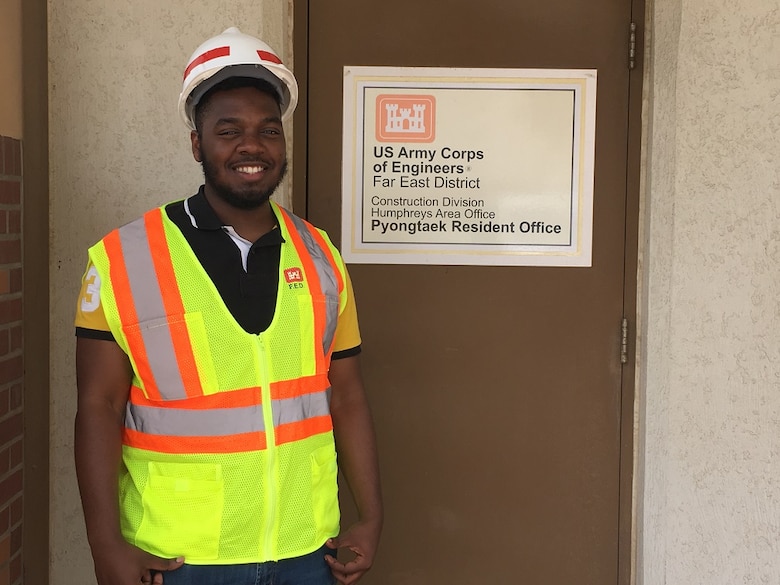 Sean Dawley Jr., a senior architecture major from Hampton University, conducts a water retention inspection at Camp Humphreys, South Korea, July 5