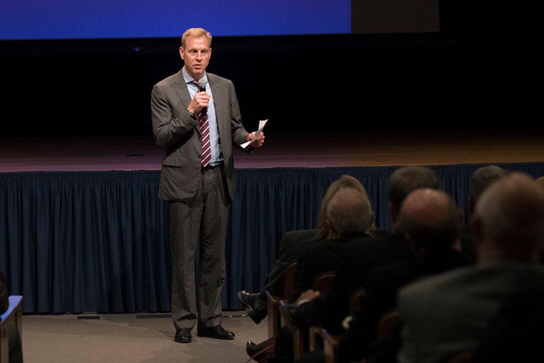 Deputy Defense Secretary Patrick M. Shanahan speaks to a crowd of people.