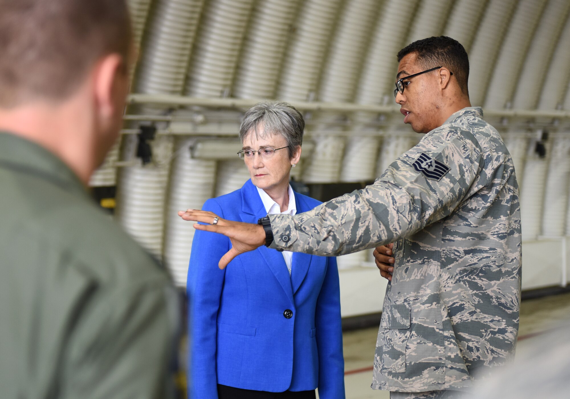 Secretary of the Air Force Heather Wilson receives a maintenance immersion brief from a 48th Maintenance Group Airman at Royal Air Force Lakenheath, England, July 11, 2018. During her visit, Wilson met with Airmen from across the base, learning what it takes to make the mission happen every day and how 48th Fighter Wing personnel are innovating by streamlining processes and reducing redundancies. (U.S. Air Force photo by Staff Sgt. Alex Fox Echols III)