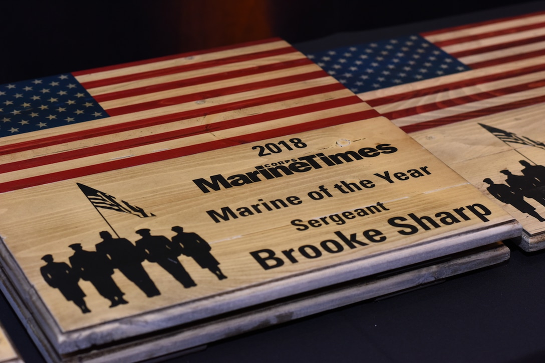 U.S. Marine Corps Sgt. Brooke Sharp receives the 2018 Marine Times Marine of the Year award July 11, 2018. The awards honor handpicked service members for their exceptional efforts in the line of duty.