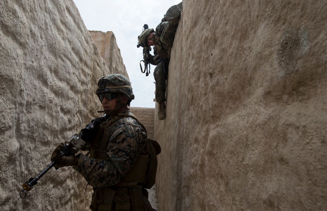 U.S. Marine Corps Lance Cpl. Austin Mellick, a fireteam leader with 2nd Battalion, 1st Marine Regiment, provides security at an Infantry Immersion Trainer during Rim of the Pacific exercise on Marine Corps Base Camp Pendleton, California, July 10, 2018. The IIT provided the Marines with “hands on” practical application of tactical skills and decision making in an immersive, scenario-based training environment. RIMPAC demonstrates the value of amphibious forces and provides high-value training for task-organized, highly capable Marine Air-Ground Task Forces enhancing the critical crisis response capability of U.S. forces and partners globally. Twenty-five nations, 46 ships, five submarines, about 200 aircraft and 25,000 personnel are participating in RIMPAC from June 27 to Aug. 2 in and around the Hawaiian Islands and Southern California.