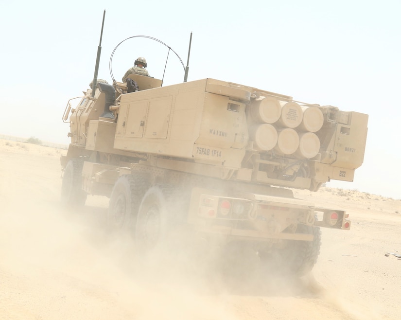 A High Mobility Artillery Rocket System from Bravo Battery, 1st Battalion, 14th Field Artillery Regiment, 65th Field Artillery Brigade, Task Force Spartan, moves to its firing position after reloading during the Golden Sparrow exercise on June 29, 2018.
