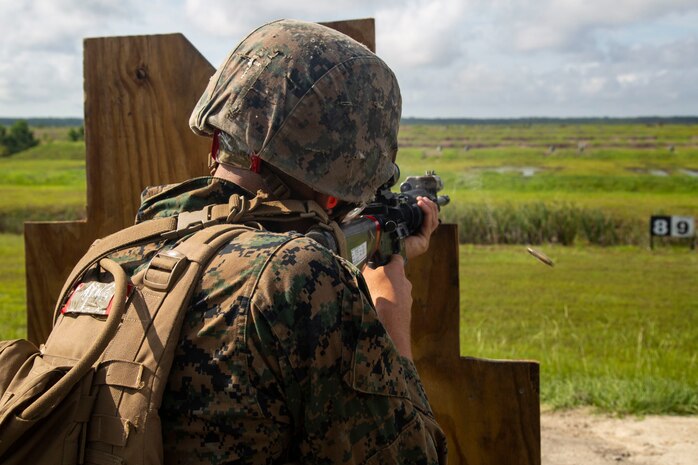A Marine with Fox Company, Marine Combat Training Battalion (MCT), School of Infantry-East, fires a M16A4 Service Rifle during Table 3 and 4 marksmanship training, Camp Lejeune, N.C., June 27, 2018. MCT conducts standards-based common combat skills training of entry-level Marines in order to create riflemen for service throughout the Marine Corps. (U.S. Marine Corps photo by Lance Cpl. Ashley Gomez)