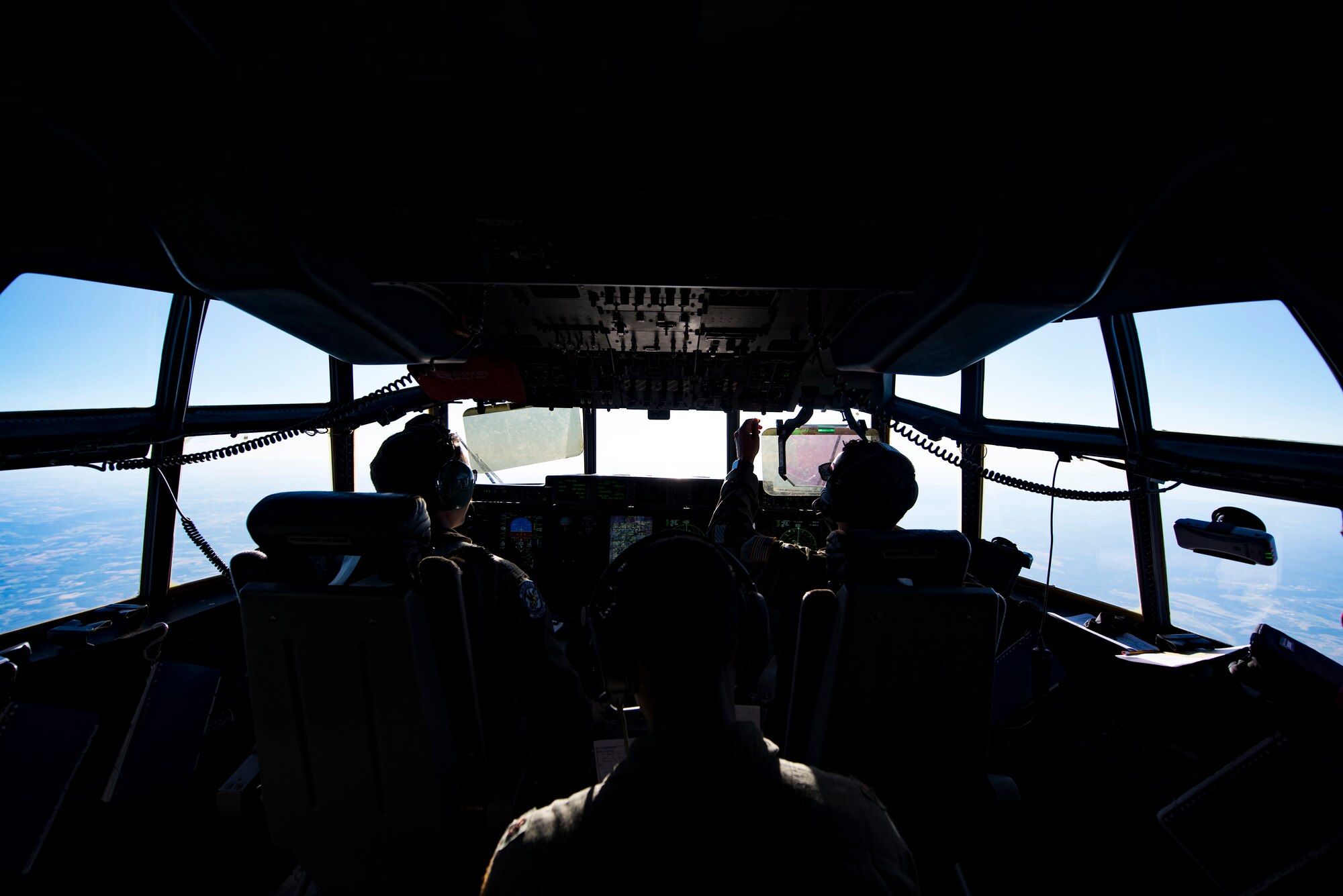 U.S. Airmen fly a C-130J Super Hercules during a training mission over Germany, July 2, 2018. Approximately 30 crew members participated in the training mission, where five C-130J Super Hercules aircraft flew in formation and delivered 21,800 pounds of cargo to a drop-zone.