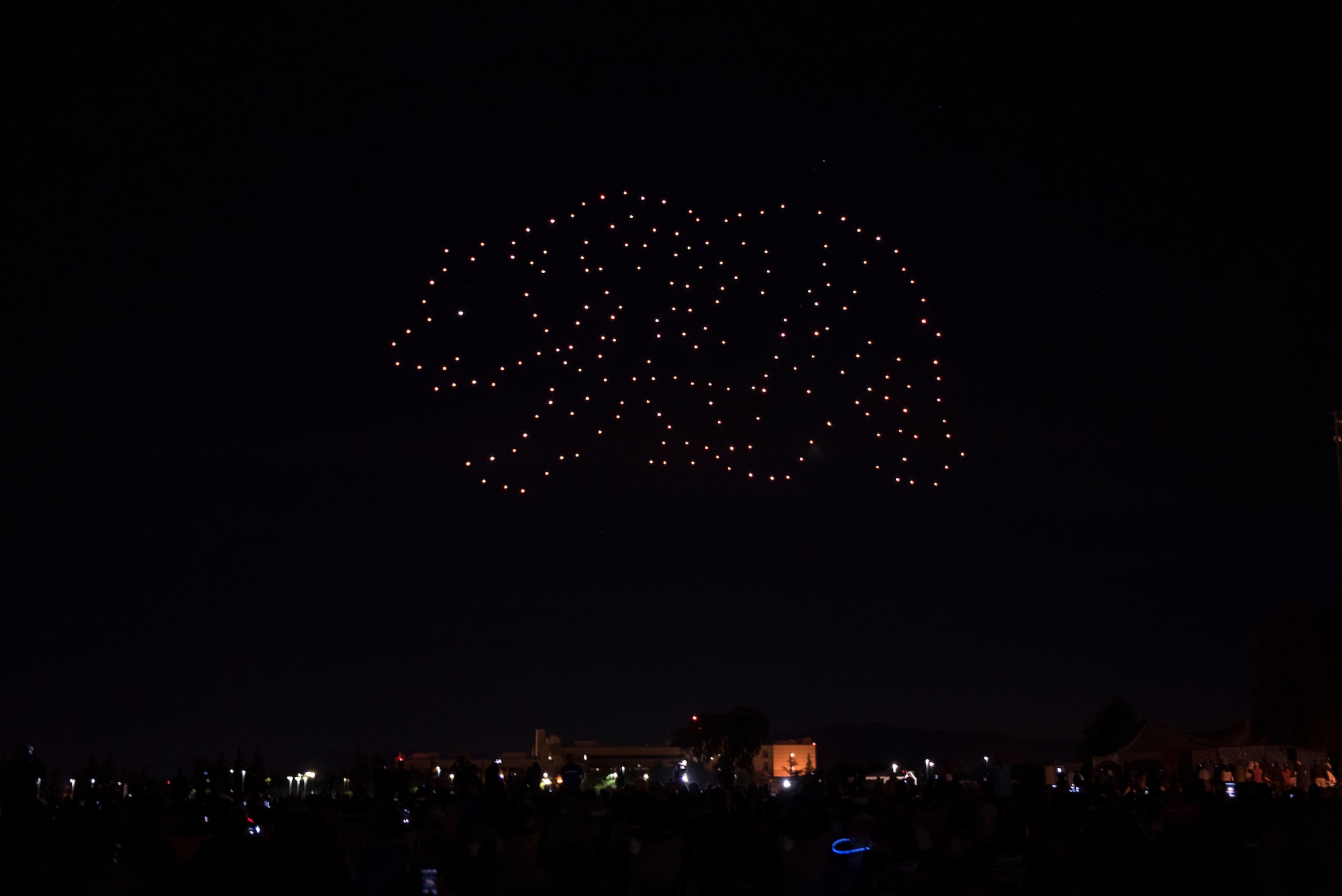 Hundreds of drones form the California Bear over Travis Air Force Base, Calif., July 5, 2018 during an Intel drone light show. The event featured numerous activities including music, bounce houses and an eight minute light show with 500 drones. (U.S. Air Force photo by Tech. Sgt. James Hodgman)