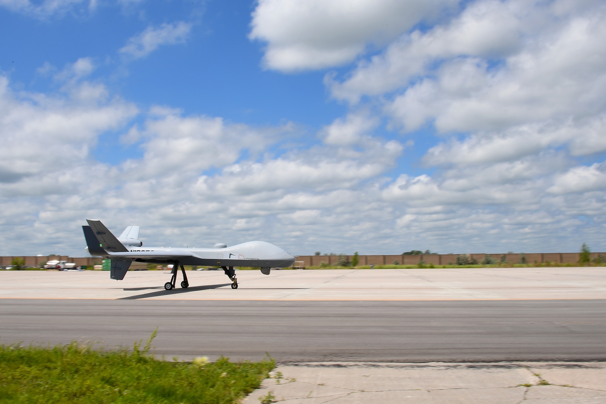 An MQ-9B SkyGuardian taxis on the Grand Sky Air Park flight line July 10, 2018, at Grand Forks Air Force Base, North Dakota. The SkyGuardian made the first trans-Atlantic flight in avionics history for a high-altitude, long-endurance remotely-piloted aircraft. (U.S. Air Force photo by Airman 1st Class Elora J. Martinez)