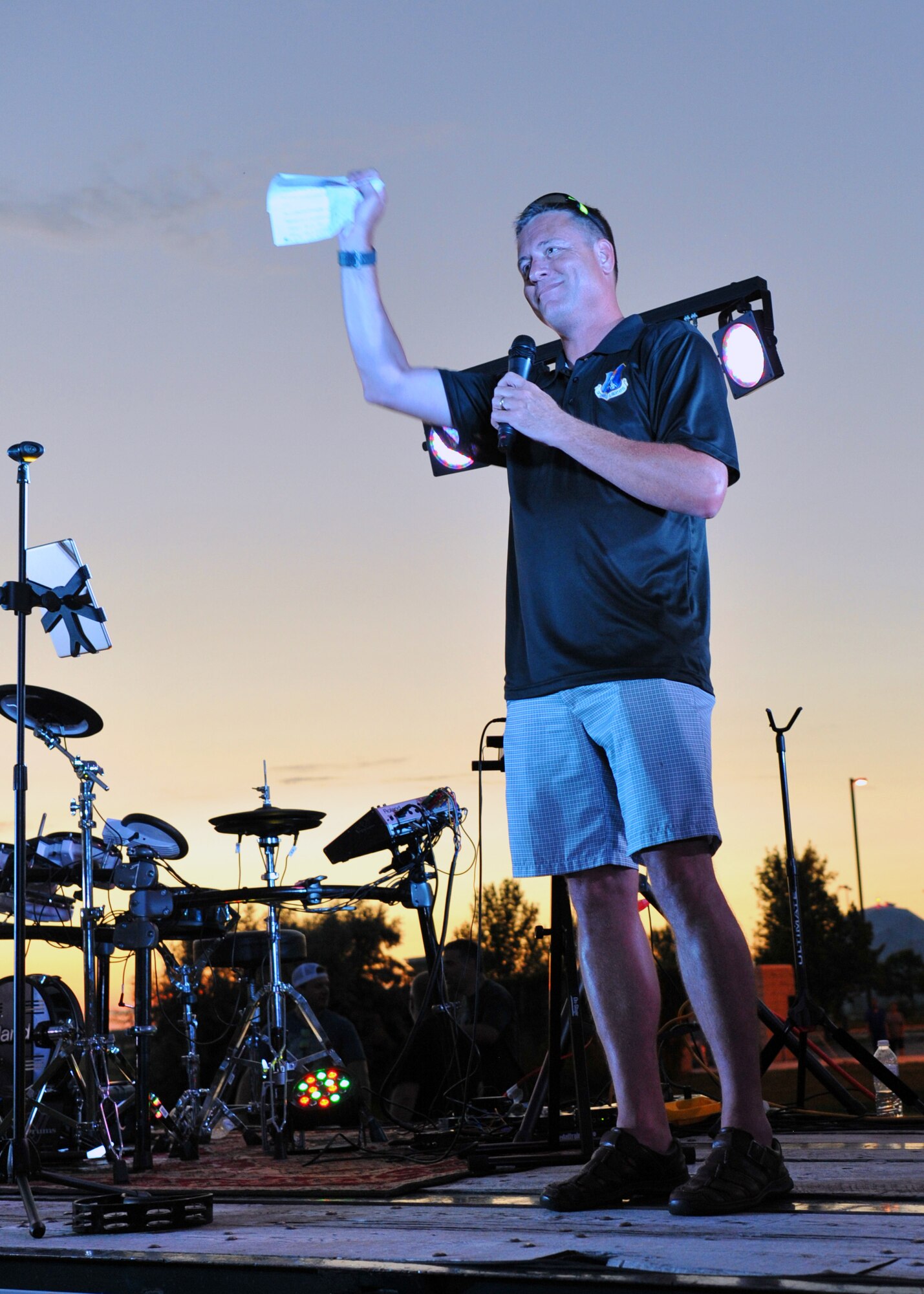 Col. Benjamin Spencer, 319th Air Base Wing commander gives a speech during Freedom Fest event held at Grand Forks Air Force Base, North Dakota, July 3, 2018. Following Spencer's remarks the event closed with a fireworks show. (U.S. Air Force photo by Staff Sgt. Marcy Copeland)