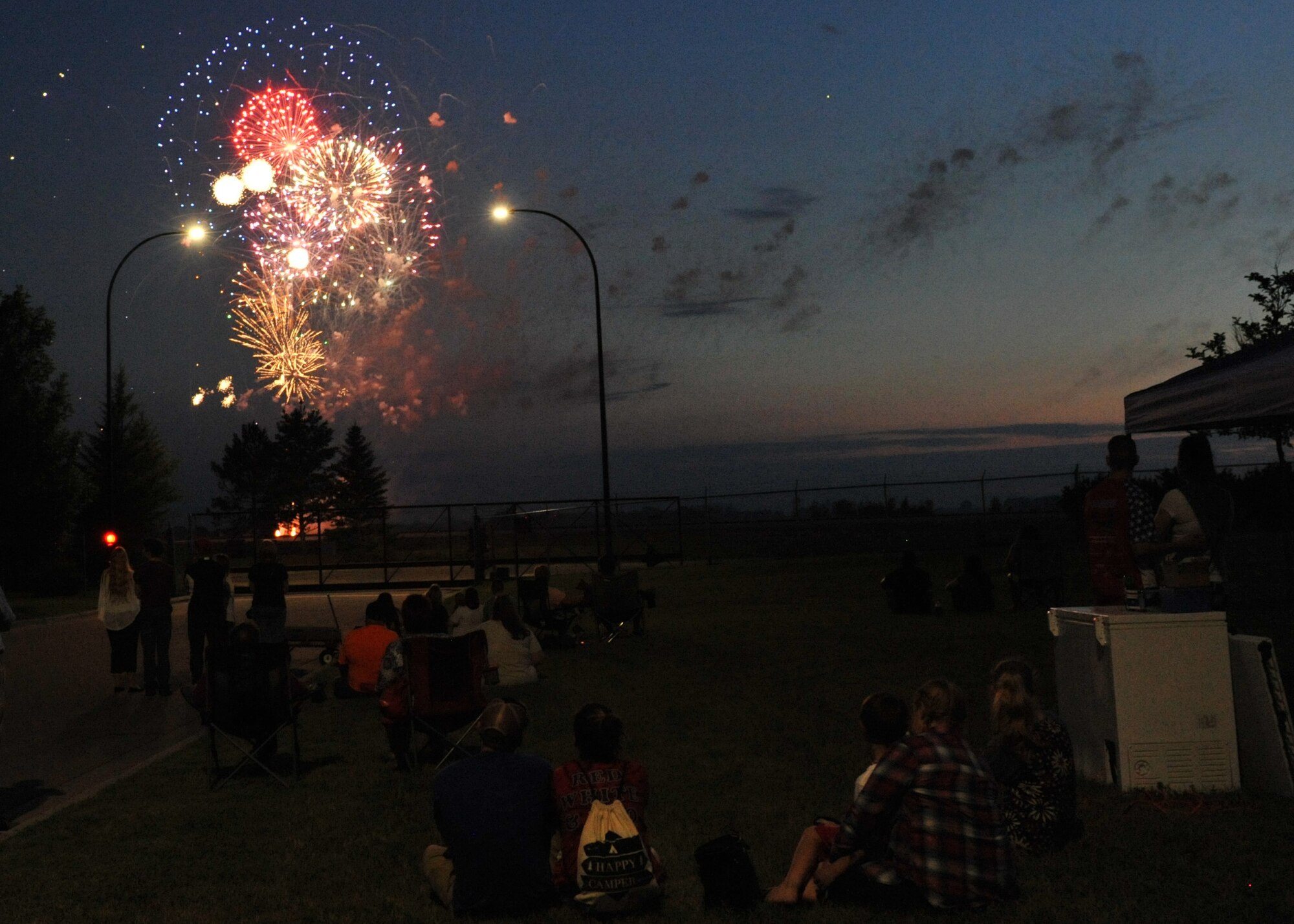 A fireworks finale lights up the sky during Freedom Fest July 3, 2018, at Grand Forks Air Force Base, North Dakota. The event was an Independence Day celebration, which closed with a fireworks dispaly over the flight line. (U.S. Air Force photo by Staff Sgt. Marcy Copeland)