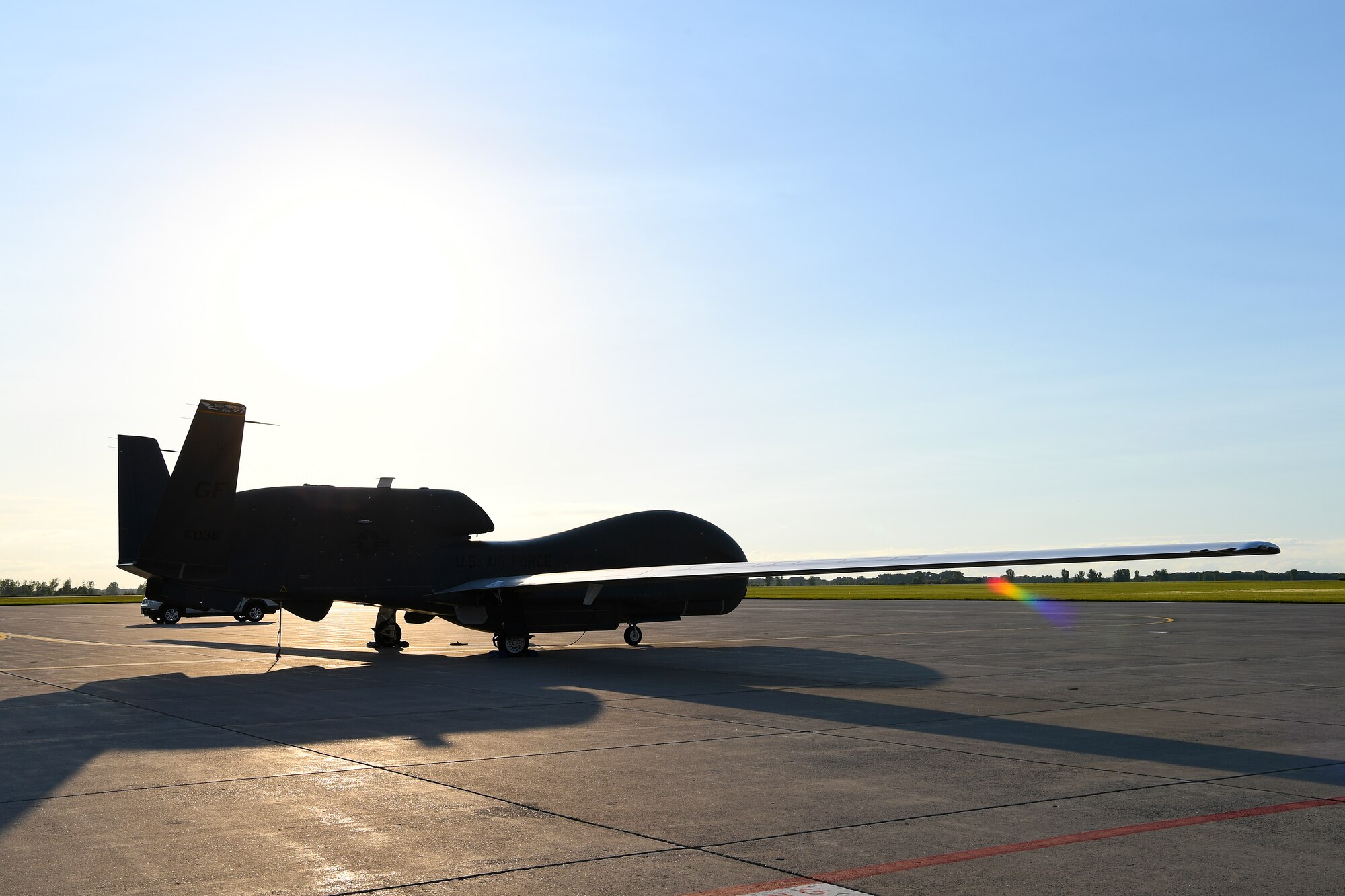 An RQ-4 Global Hawk sits on the flight line as a static display during Freedom Fest hosted on July 3, 2018, on Grand Forks Air Force Base, North Dakota. The event was open only to Department of Defense identification cardholders, who not only had the chance to celebrate Independence Day, but learn more about the Global Hawk high-altitude intelligence, surveillance and reconnaissance mission. (U.S. Air Force photo by Airman 1st Class Elora J. Martinez)