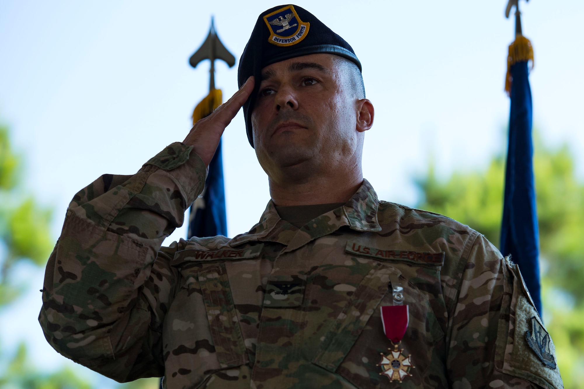 Col. Kevin Walker, 820th Base Defense Group (BDG) outgoing commander, renders his final salute to the 820th BDG during a change of command ceremony, July 12, 2018, at Moody Air Force Base, Ga. Col. Benito Barron, 820th BDG commander, who recently relinquished his duties as the Chief of the Homeland Defense and Protection Division for Headquarters United States Northern Command, will now command the 820th BDG. The ceremony represents the formal passing of responsibility, authority and accountability of command from one officer to another. The 820th BDG is the Air Force’s only unit specifically designed to provide fully integrated defense operations. (U.S. Air Force photo by Airman 1st Class Erick Requadt)