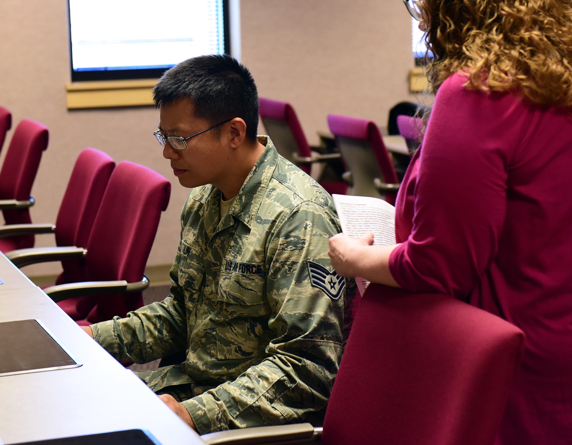 U.S. Air Force Staff Sgt. Alan Lin, a flight kitchen manager assigned to the 509th Force Support Squadron, listens to test instructions before taking the Defense Language Proficiency Test for Mandarin Chinese at Whiteman Air Force Base, Missouri, June 19, 2018. All ranks from all military branches and civilians may take the DLPT, which offers tests for more than 60 languages.