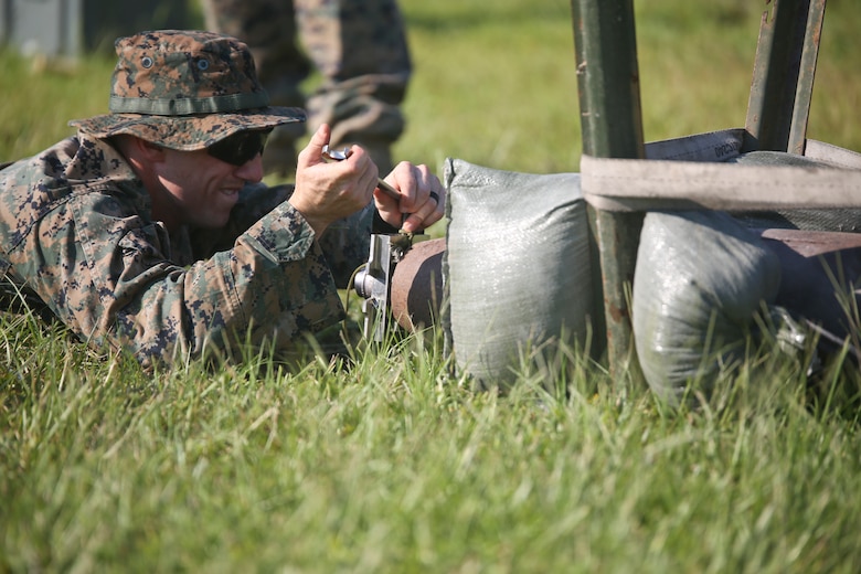 Sgt. Derek Ford fastens a piece of equipment in place during a tool familiarization range aboard MCAS Beaufort July 11. This type of training is conducted regularly to ensure that each Marine is proficient and ready to use the equipment correctly. Ford is an Explosive Ordnance Disposal Marine with Marine Wing Support Detachment 31.