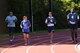 The 932nd Command Chief, Chief Master Sgt. Barbara Gilmore, (second from left) encourages others in fitness by running with each group testing on the drill weekend, July 7, 2018, at Scott Air Force Base, Ill.  She runs many more laps than the required 1.5 mile test, as she helps multiple groups over several hours.  (U.S. Air Force photo by Lt. Col. Stan Paregien)