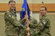 Maj. Tito Ruiz, right, accepts command of the 1341st Security Support Squadron from Col. Aaron Guill, 341st Security Forces Group commander during a change of command ceremony July 12, 2018, at the Grizzly Bend on Malmstrom AFB, Mont.