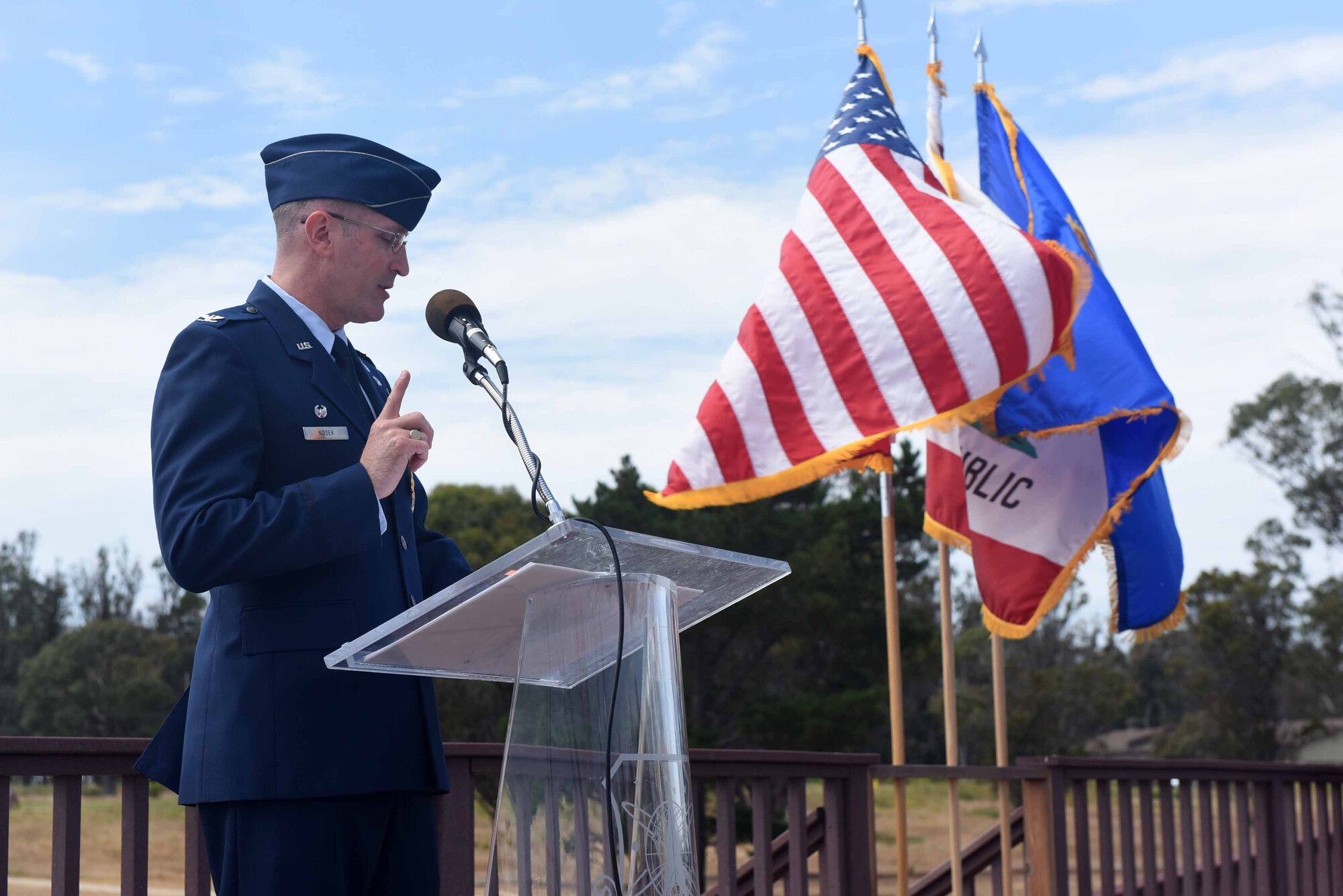 Col. Paul Nosek, 30th Mission Support Group outgoing commander, gives a speech during the 30th MSG change of command ceremony on July 12, 2018, at Vandenberg Air Force Base, Calif. The 30th MSG provides security, law enforcement, disaster response, civil engineer, base services, mission support, morale services, contracting, and logistical support. (U.S. Air Force photo by Tech. Sgt. Jim Araos/Released)