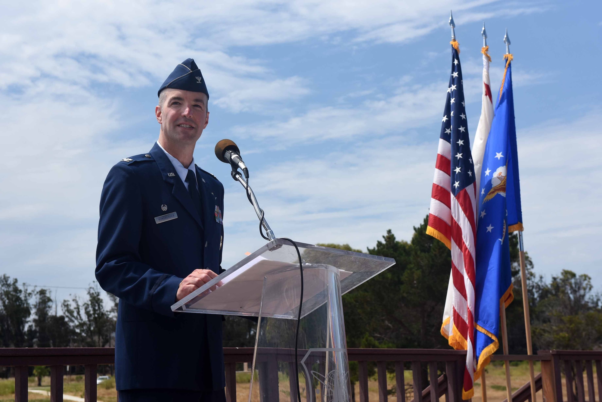 Col. Michael Hunsberger, 30th Mission Support Group inbound commander, gives a speech during a change of command ceremony on July 12, 2018, at Vandenberg Air Force Base, Calif. The 30th MSG provides security, law enforcement, disaster response, civil engineer, base services, mission support, morale services, contracting, and logistical support. (U.S. Air Force photo by Tech. Sgt. Jim Araos/Released)