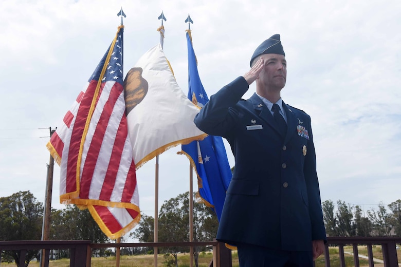 Col. Michael Hunsberger, 30th Mission Support Group inbound commander, renders his first salute to the 30th MSG during a change of command ceremony on July 12, 2018, at Vandenberg Air Force Base, Calif. The 30th MSG provides security, law enforcement, disaster response, civil engineer, base services, mission support, morale services, contracting, and logistical support. (U.S. Air Force photo by Tech. Sgt. Jim Araos/Released)