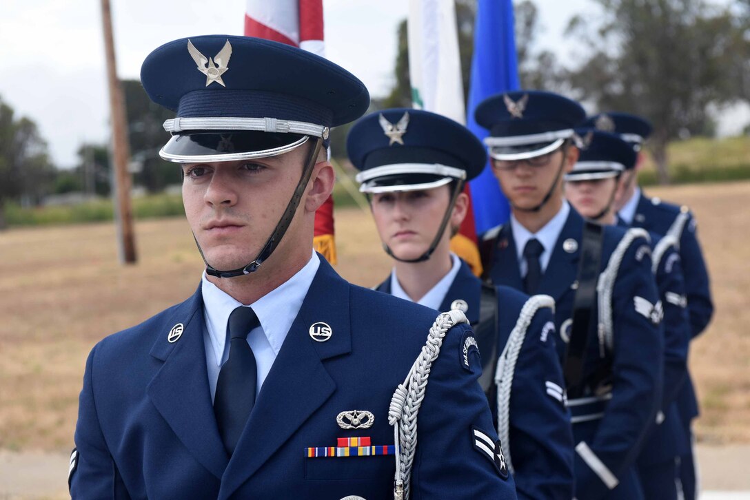 Vandenberg honor guardsmen prepare for the 30th Mission Support Group change of command ceremony on July 12, 2018, at Vandenberg Air Force Base, Calif. The 30th MSG provides security, law enforcement, disaster response, civil engineer, base services, mission support, morale services, contracting, and logistical support. (U.S. Air Force photo by Tech. Sgt. Jim Araos/Released)