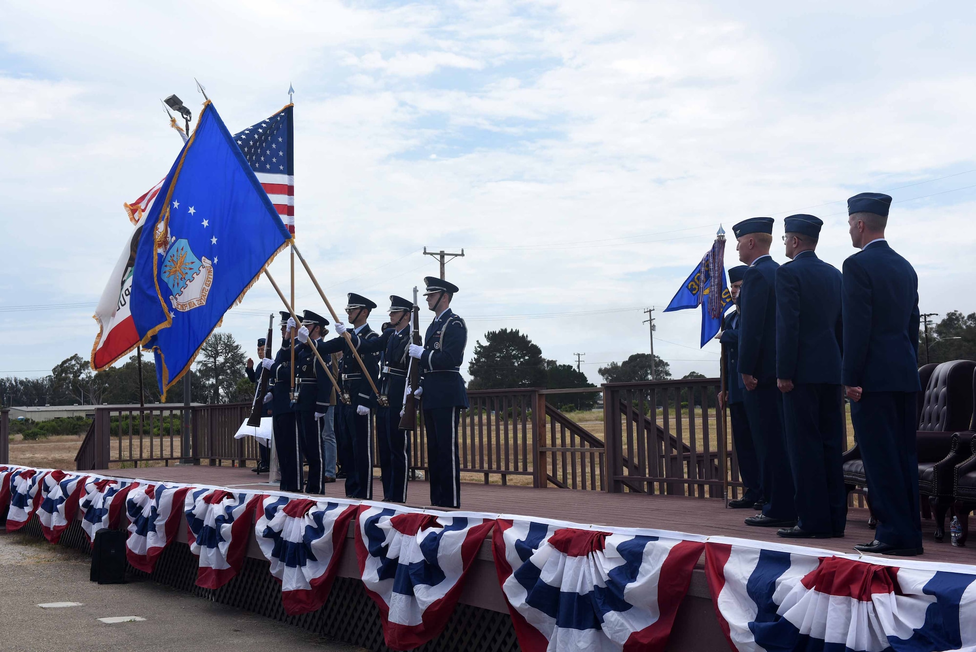 Vandenberg honor guardsmen present the colors during the 30th Mission Support Group change of command ceremony on July 12, 2018, at Vandenberg Air Force Base, Calif. The 30th MSG provides security, law enforcement, disaster response, civil engineer, base services, mission support, morale services, contracting, and logistical support. (U.S. Air Force photo by Tech. Sgt. Jim Araos/Released)