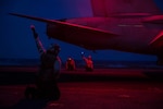 PHILIPPINE SEA (July 06, 2018) Final checkers signal for the launch of an F/A-18E Super Hornet, assigned to Strike Fighter Squadron (VFA) 195, on the flight deck of the Navy's forward-deployed aircraft carrier, USS Ronald Reagan (CVN 76). Ronald Reagan, the flagship of Carrier Strike Group 5, provides a combat-ready force that protects and defends the collective maritime interests of its allies and partners in the Indo-Pacific region.