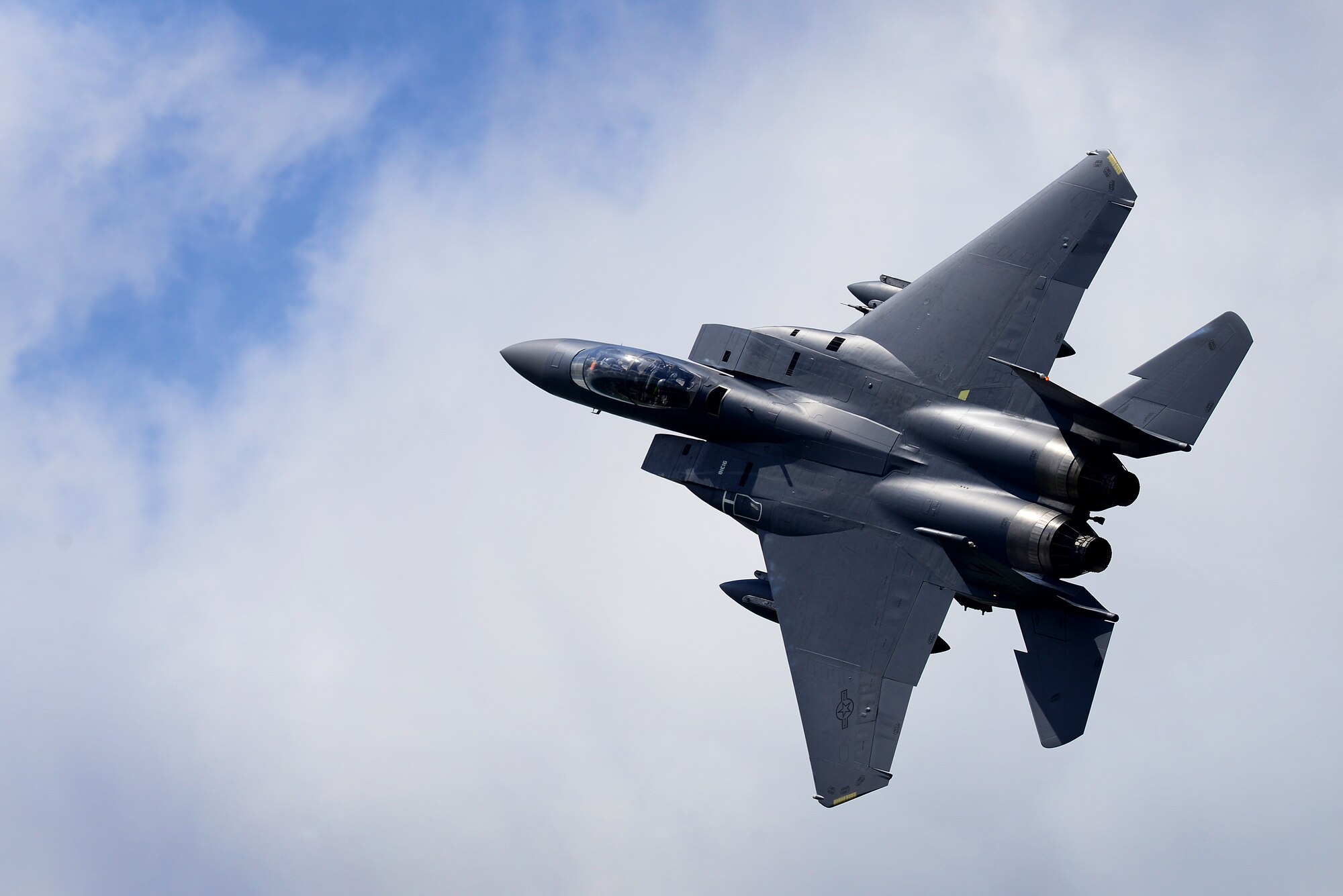 An F-15E Strike Eagle assigned to the 492nd Fighter Squadron flies over Royal Air Force Lakenheath, England, May 10. The 492nd trains regularly to ensure RAF Lakenheath brings unique air combat capabilities to the fight. (U.S. Air Force photo/ Tech. Sgt. Matthew Plew)