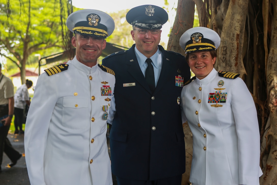 The official party awaits the DLA Pacific Change of Command ceremony. From left: Navy Capt. Timothy Daniels, outgoing DLA Pacific Commander; Air Force Maj. Gen. Mark Johnson, director of DLA Logistics Operations; and Navy Capt. Kristin Acquavella, incoming DLA Pacific commander. (Photo by Marine Cpl. Patrick Mahoney)