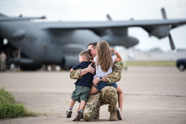 More than 60 members of the Kentucky Air National Guard’s 123rd Airlift Wing are reunited with friends and family as they return to their home base in Louisville, Ky., July 6, 2018, after completing a four-month deployment to the Persian Gulf region in support of Operation Inherent Resolve. (U.S. Air National Guard photo by Master Sgt. Phil Speck)