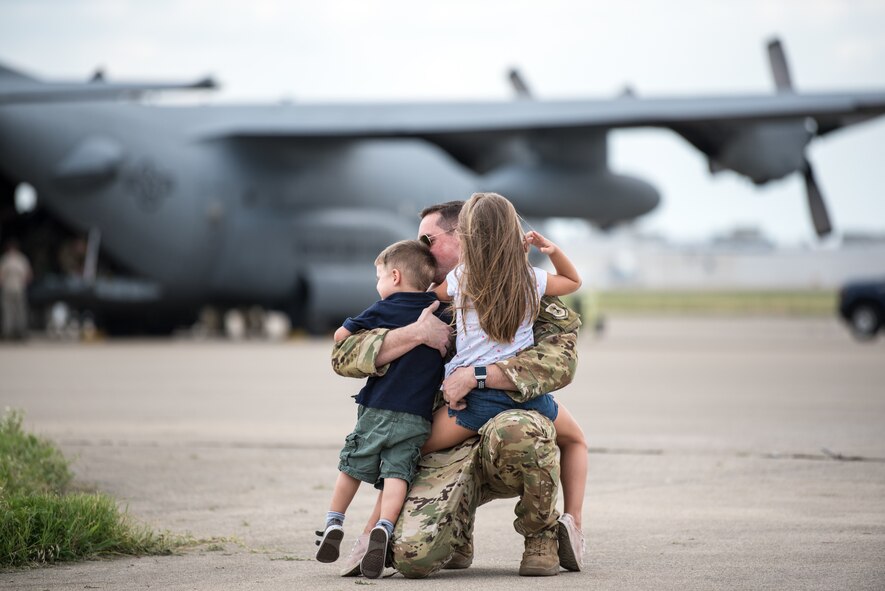More than 60 members of the Kentucky Air National Guard’s 123rd Airlift Wing are reunited with friends and family as they return to their home base in Louisville, Ky., July 6, 2018, after completing a four-month deployment to the Persian Gulf region in support of Operation Inherent Resolve. (U.S. Air National Guard photo by Master Sgt. Phil Speck)