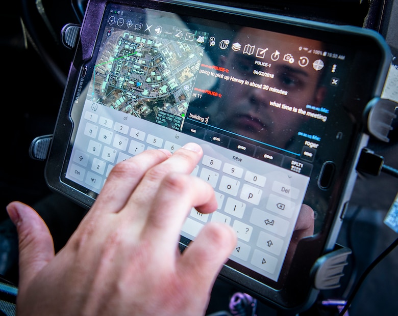 A 96th Security Forces Squadron Airman uses the android tactical assault kit to send a message from his patrol vehicle July 5, 2018, at Eglin Air Force Base, Fla. (U.S. Air Force photo by Samuel King Jr.)